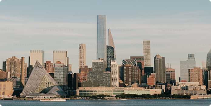 Modern city skyline with high-rise buildings along a waterfront